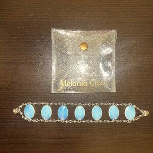 Melania Clara, New in packaging. Beaded bracelet with oval stones